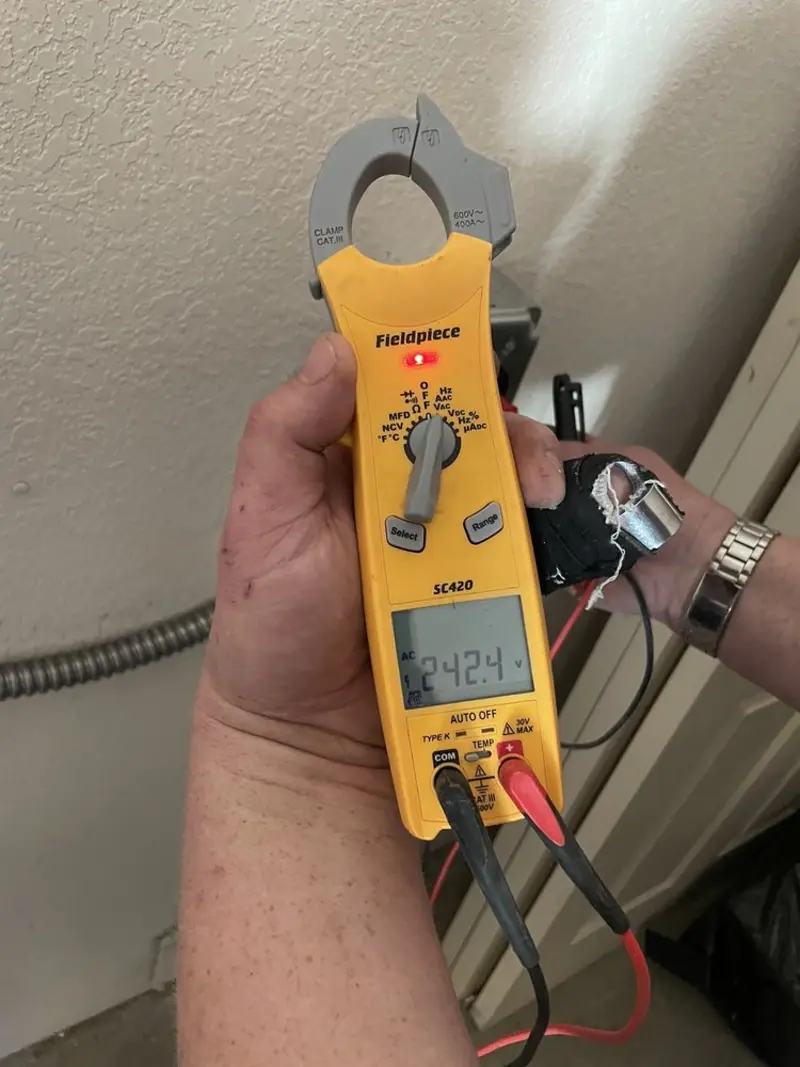 Voltage testing with clamp meter during Aluminum Wiring Replacement in Montville